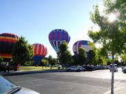Hot Air Balloons getting ready to take off from behind City Hall on 7-1-16 -  Picture by Lori Hooper.